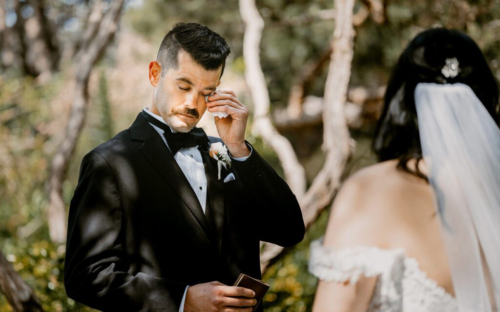 Image of groom crying to show example of an amazing wedding photos