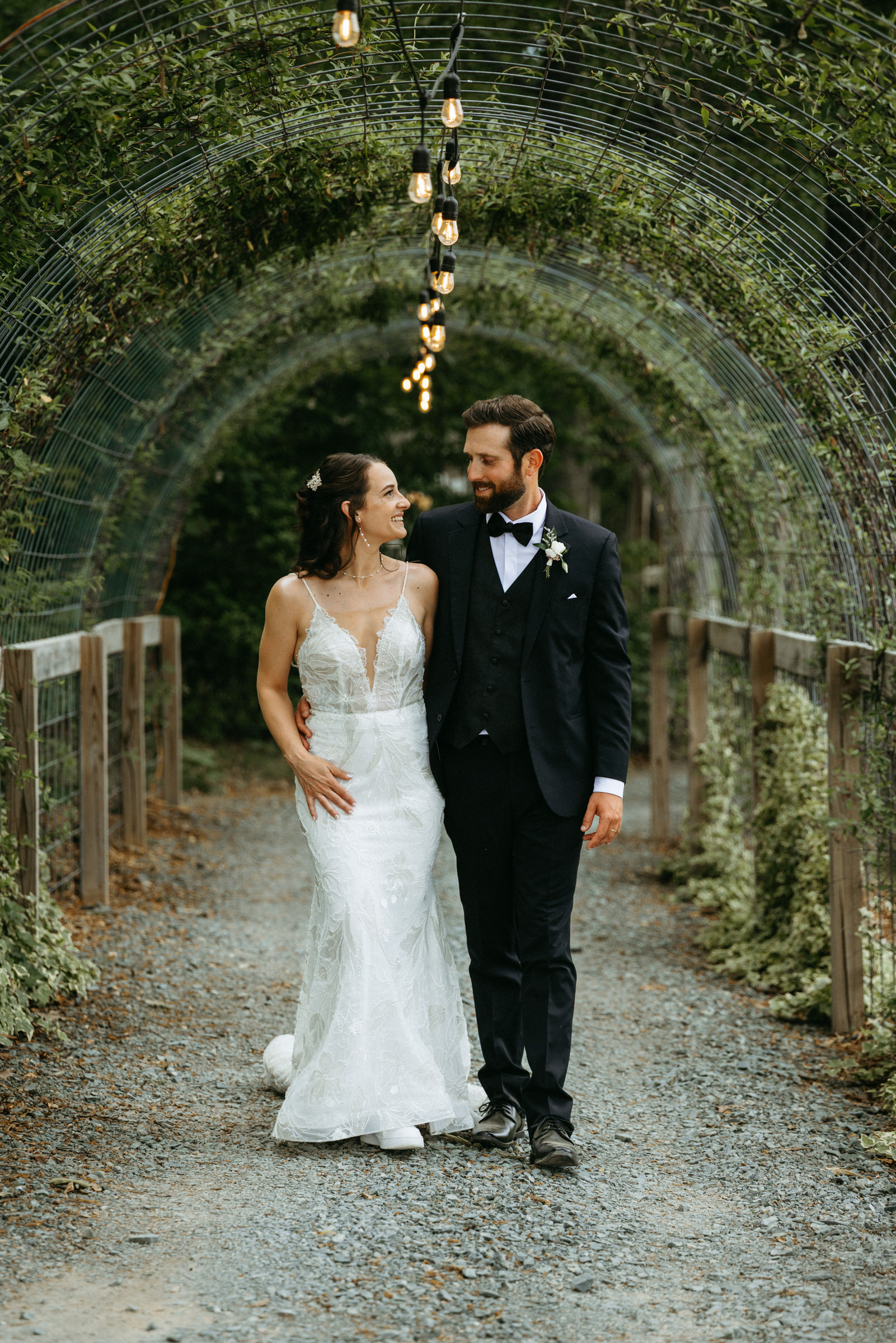 Romantic wedding portraits beneath the trees at Wolf Pond Haven in North Carolina